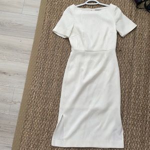 White shirtsleeve dress with small slit